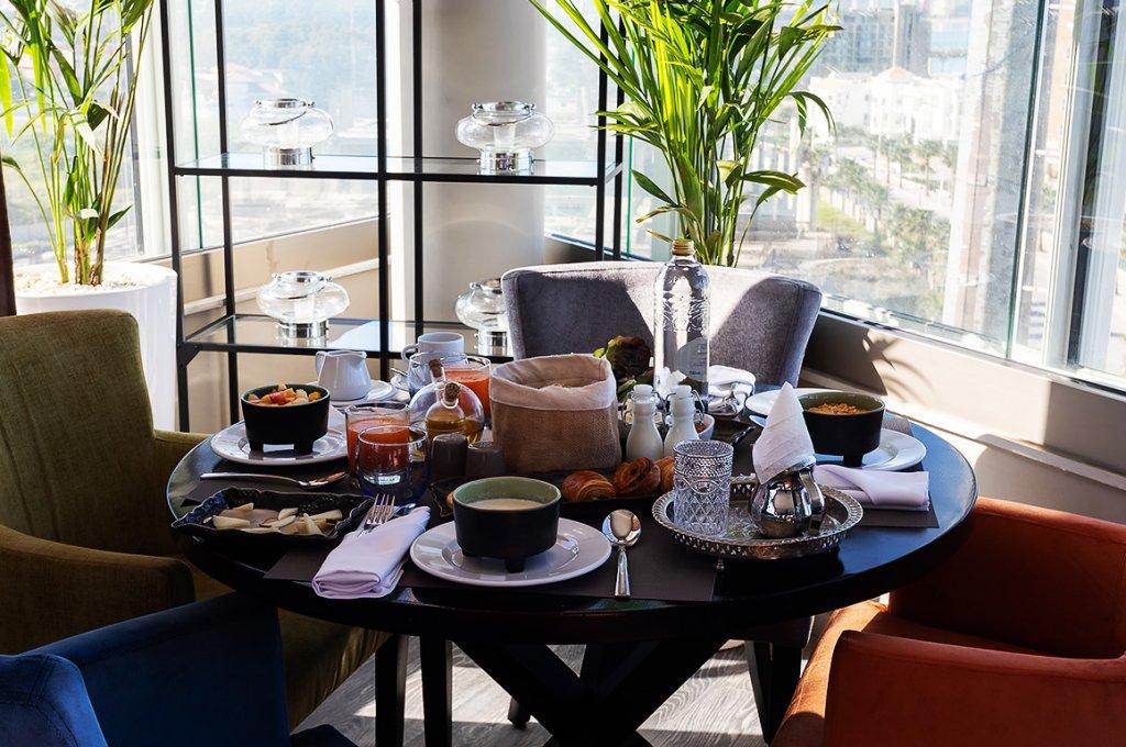 Mandarin Palace Hotel & Spa Tangier Exterior photo A table set for afternoon tea at the Mandarin Oriental, Hong Kong